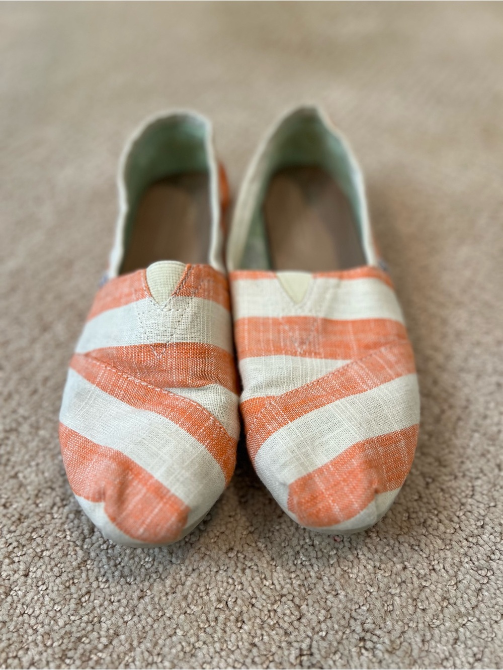 Toms Women’s Orange and Cream Striped Slip-Ons